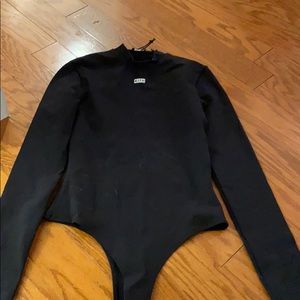 Black kith body suit